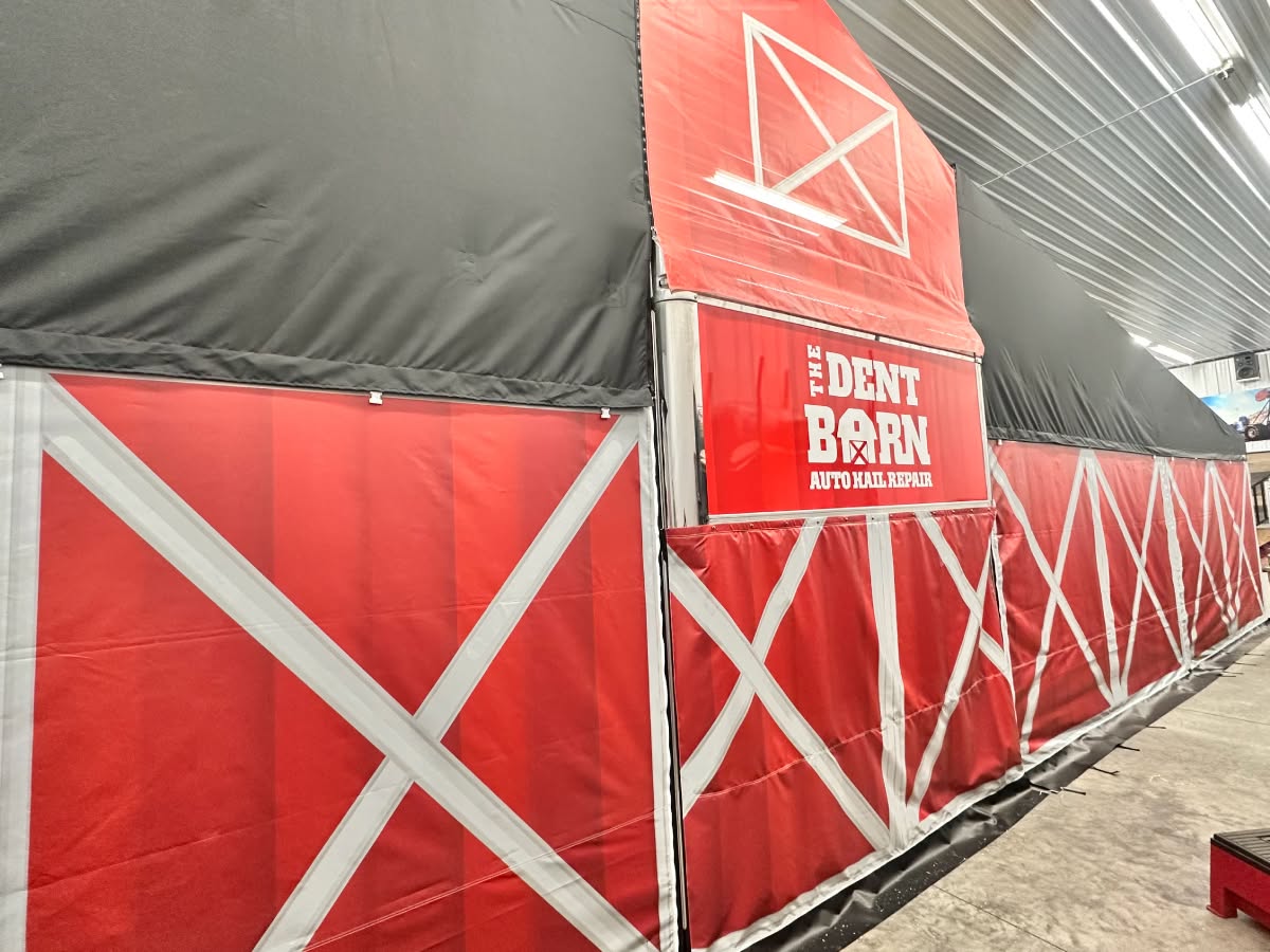 The Dent Barn red printed awning side walls with custom graphics