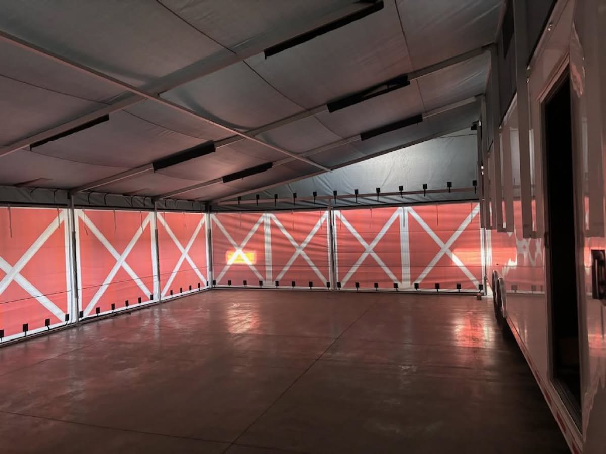 Interior view of a DMP enclosed trailer awning with side walls mounted to the trailer sidewall