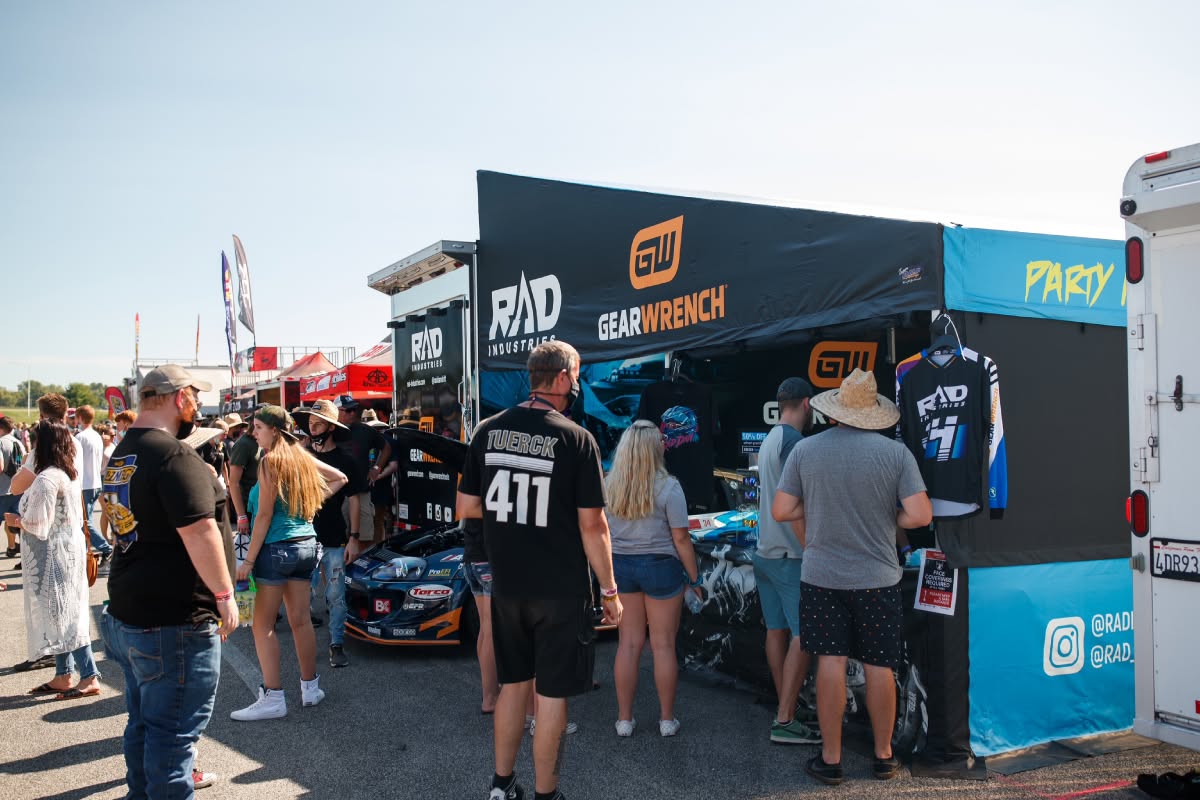 GEARWRENCH and RAD Industries awning drawing a crowd at a race event