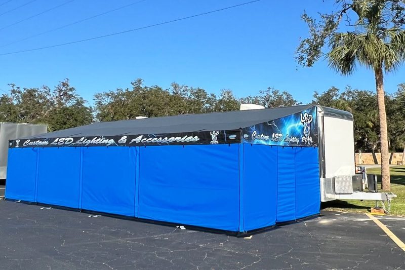 Custom LED Lighting and Accessories trailer awning with blue printed side walls