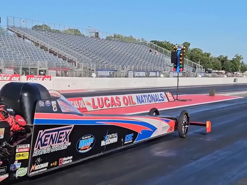The Kentex and DMP Awnings dragster on the starting line at the Lucas Oil NHRA Nationals in Brainerd