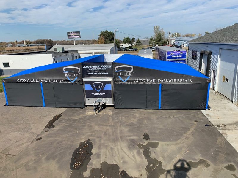 Aerial view of an ELITE Hail Team twin-canopy trailer awning built by DMP