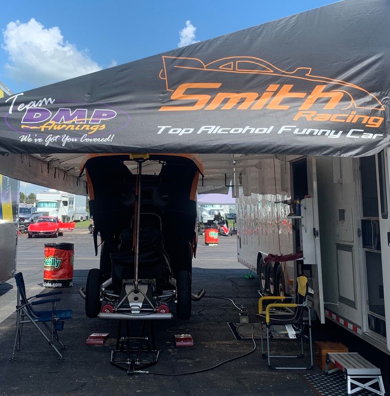 Smith Racing Top Alcohol Funny Car printed awning with the car body raised in the pits